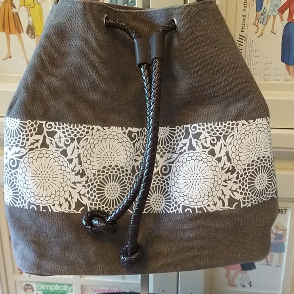 Stamped canvas shoulder bag